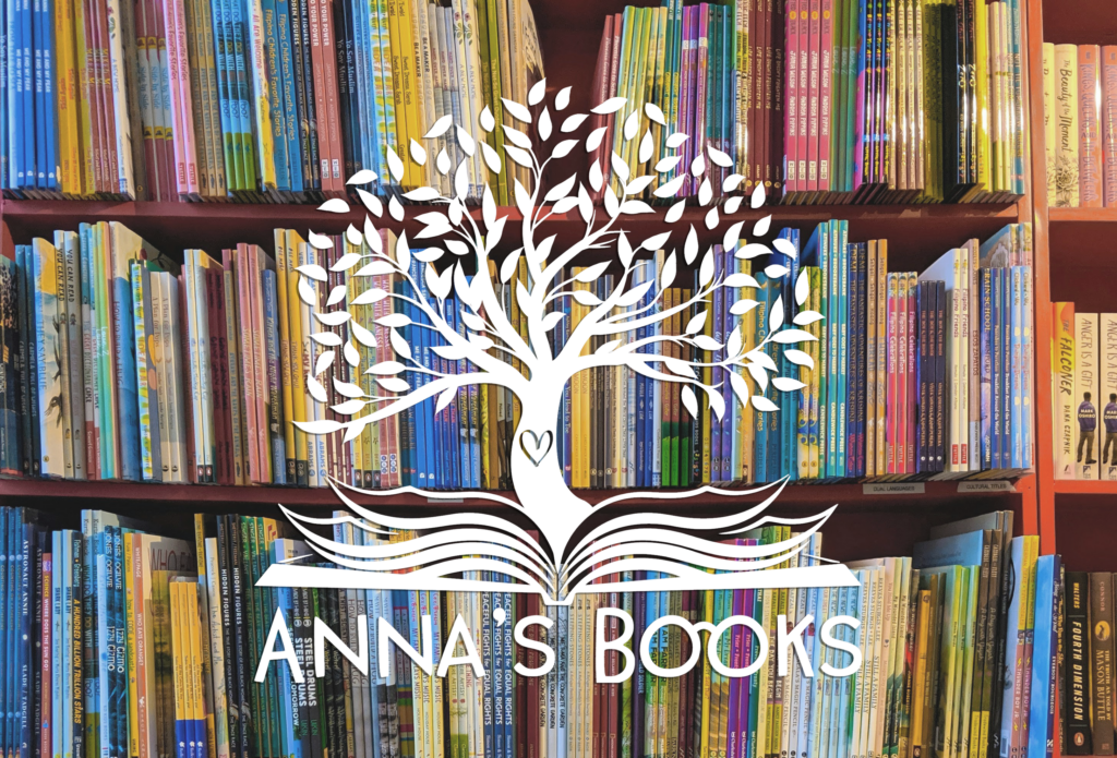 Anna's Books logo of a tree coming out of a book overlayed on a background of children's books